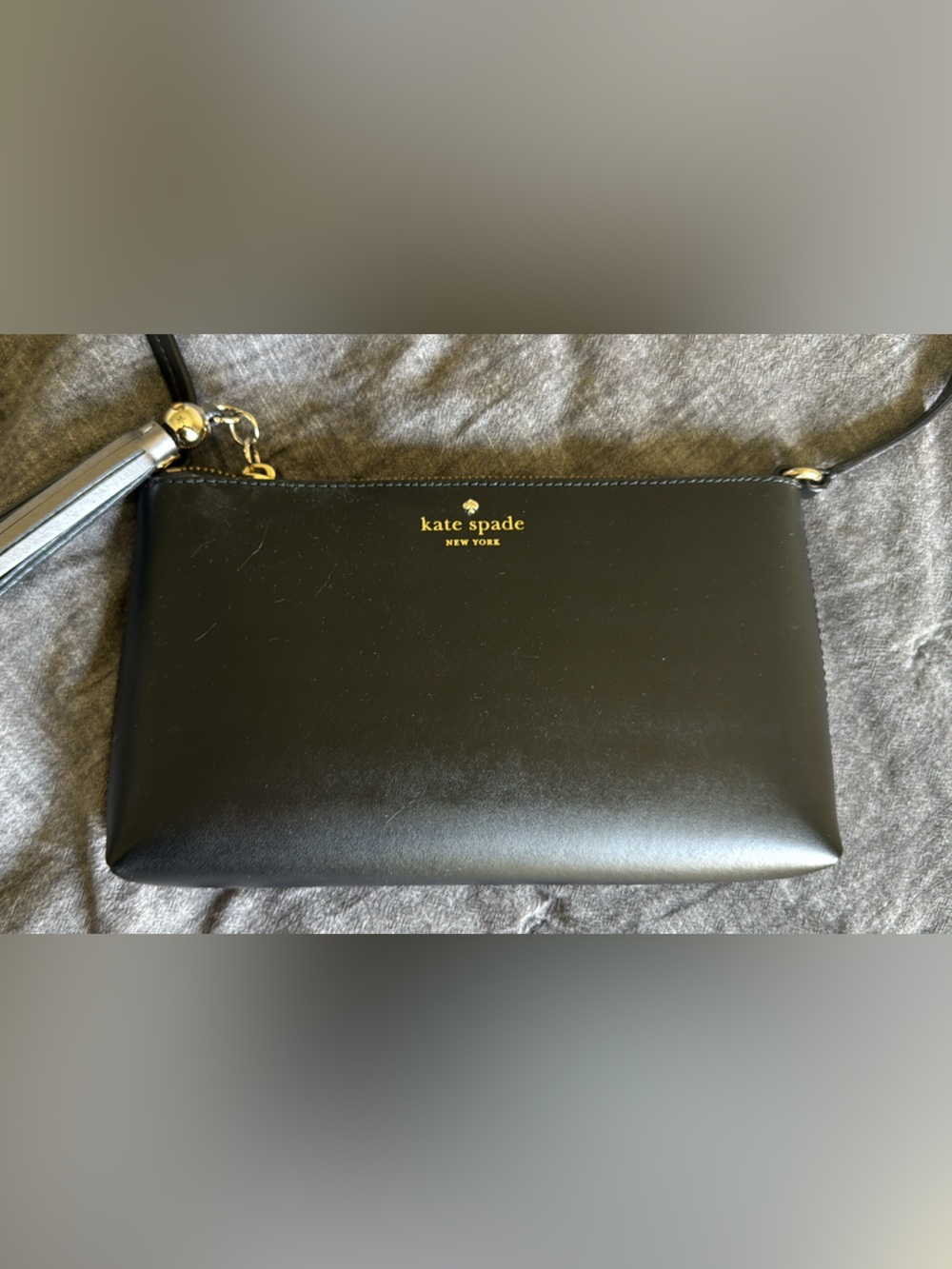 kate spade black leather crossbody with gold logo